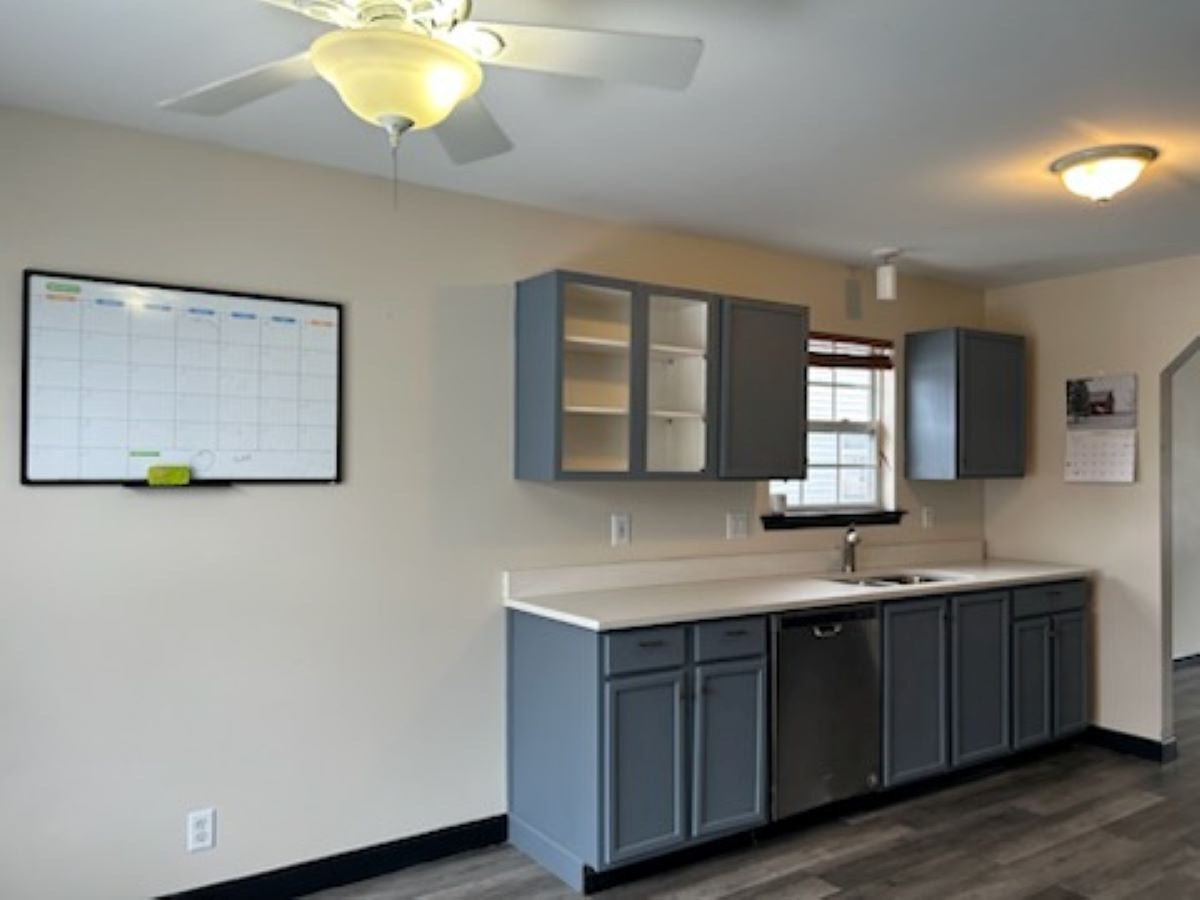 711 Prospect Street Kirkland, IL 60146 - Photo 3 of 23 a bathroom with a double vanity sink and a mirror