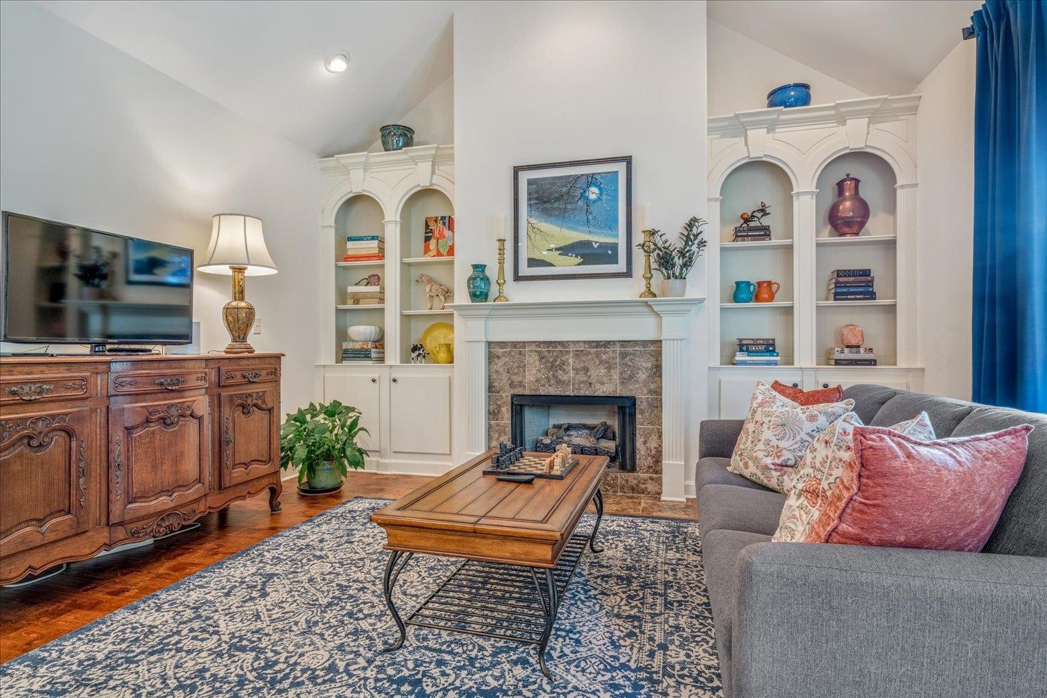 1349 Beautiful Place Collierville, TN 38017 - Photo 24 of 40 a living room with furniture and a fireplace