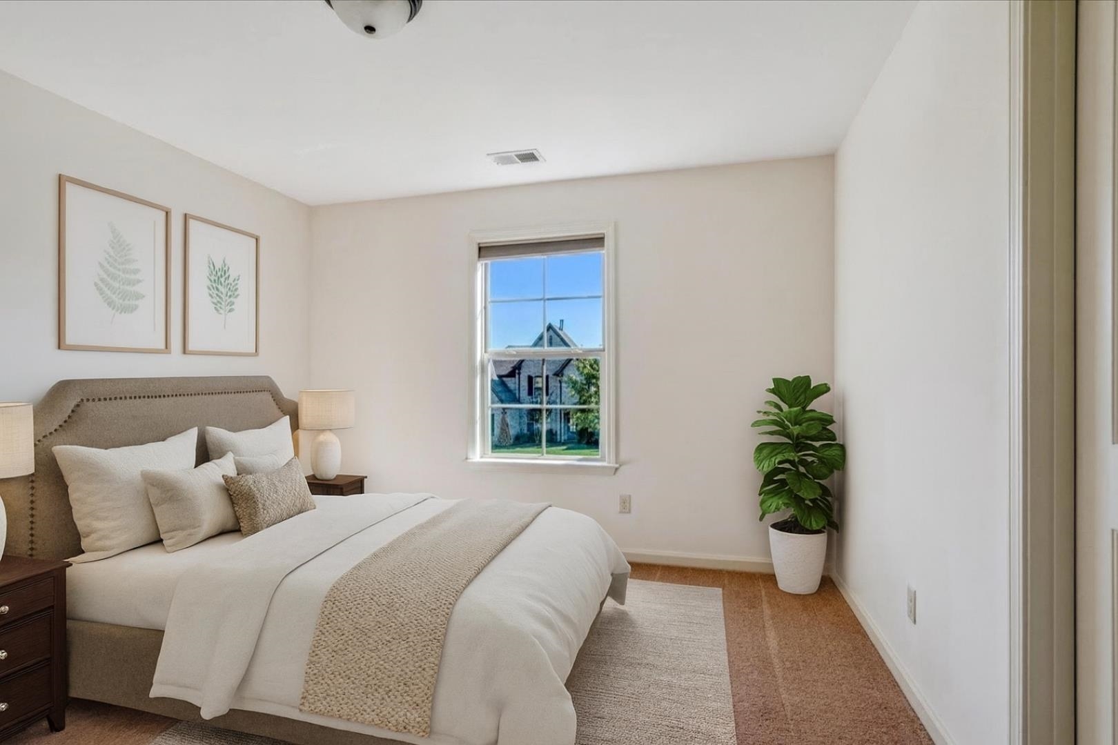 1349 Beautiful Place Collierville, TN 38017 - Photo 35 of 40 a bedroom with a bed and a potted plant