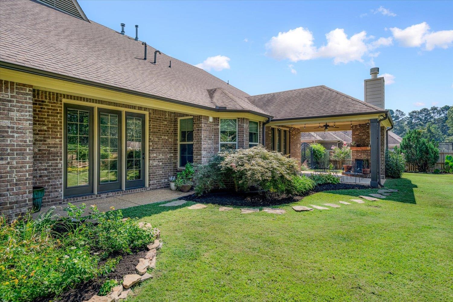 1349 Beautiful Place Collierville, TN 38017 - Photo 9 of 40 a front view of a house with garden