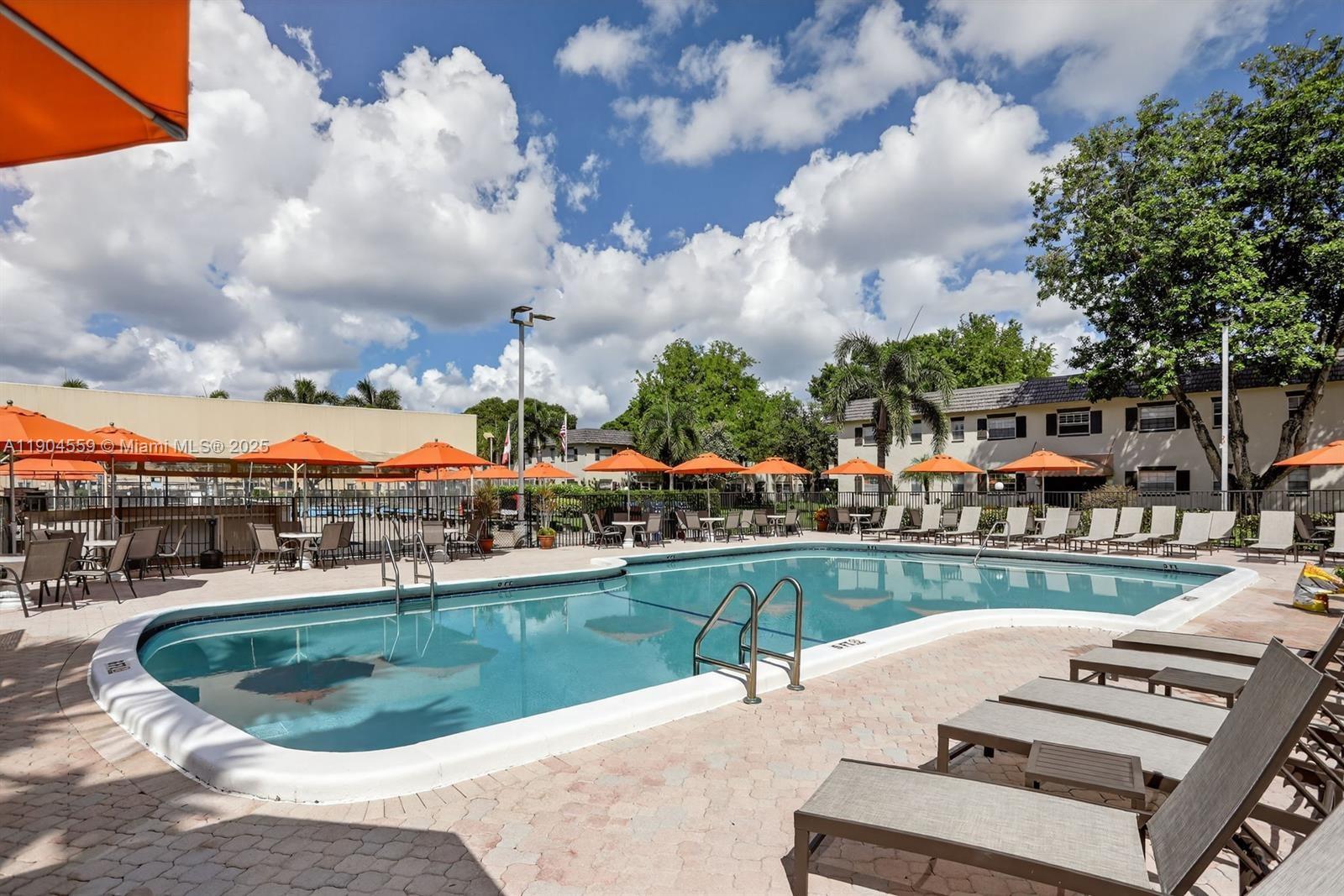 a view of a swimming pool and a terrace
