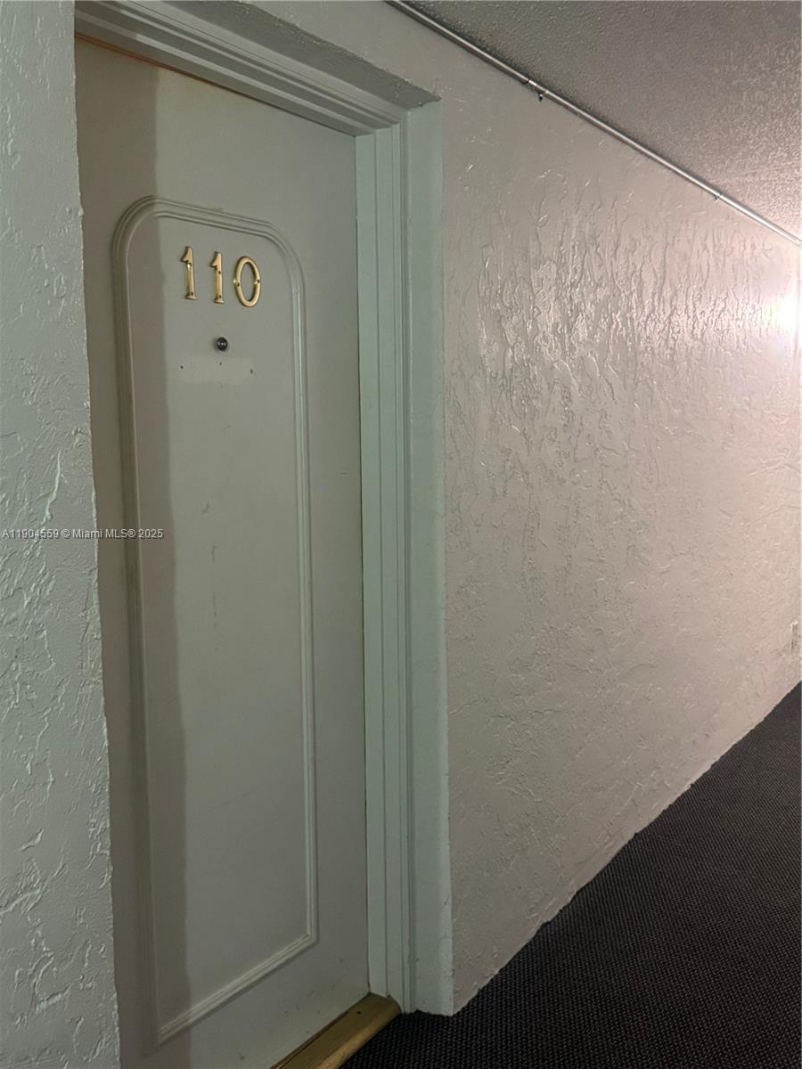 5640 Southwest 3rd Place, Unit 110 Margate, FL 33068 - Photo 15 of 28 a door with a shower