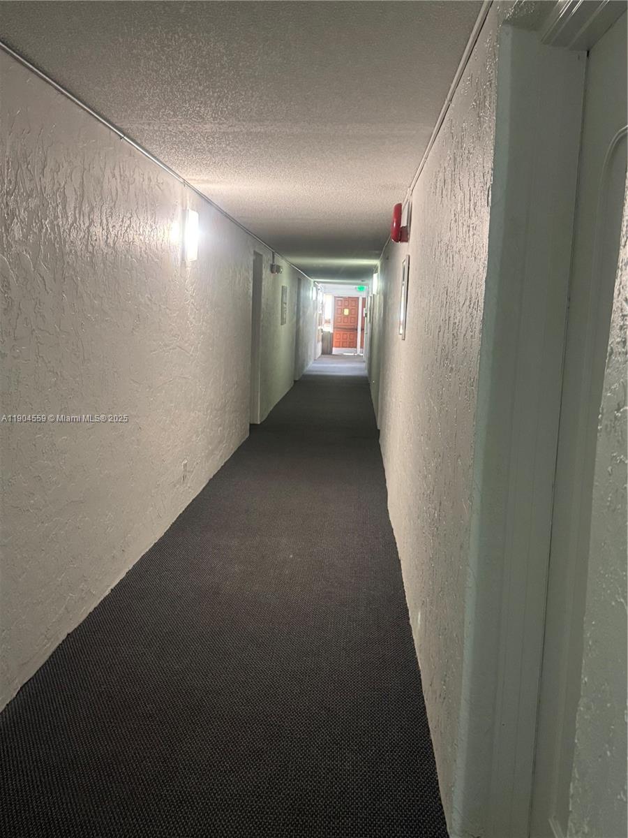 5640 Southwest 3rd Place, Unit 110 Margate, FL 33068 - Photo 16 of 28 a view of hallway