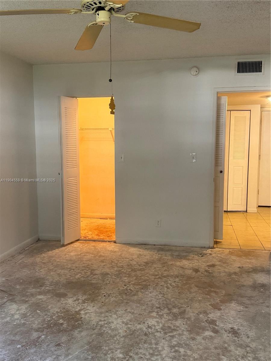 5640 Southwest 3rd Place, Unit 110 Margate, FL 33068 - Photo 20 of 28 a view of an empty room with a window