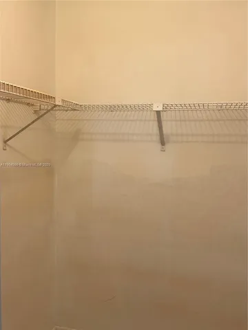 a close view of shoes stand and cabinets