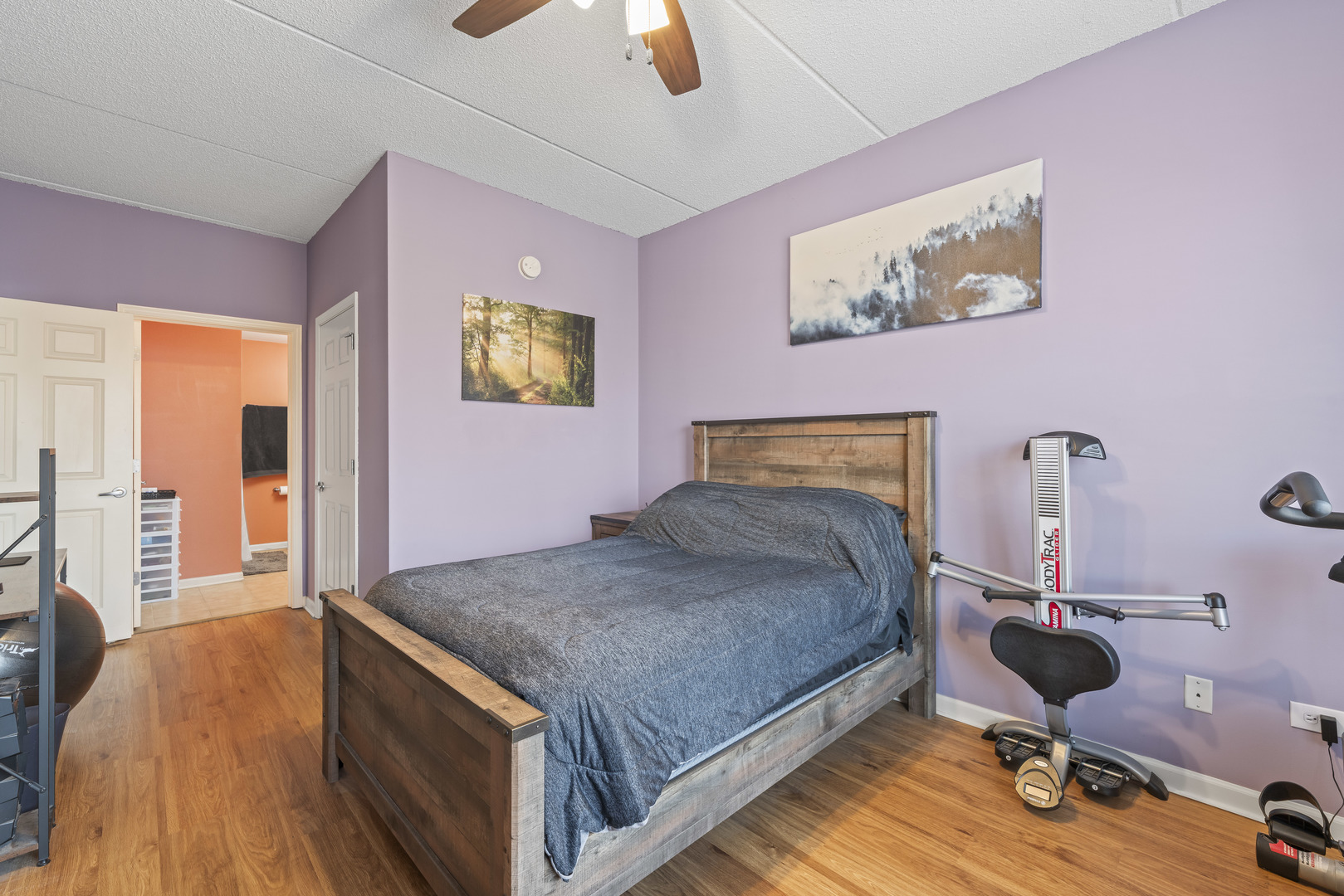 9530 Cook Avenue, Unit 211 Oak Lawn, IL 60453 - Photo 14 of 34 a bed room with a bed and a chair