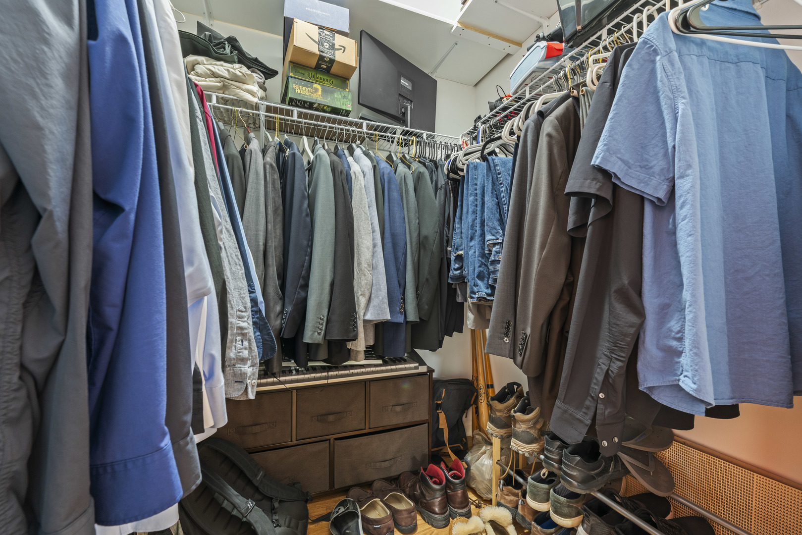 9530 Cook Avenue, Unit 211 Oak Lawn, IL 60453 - Photo 16 of 34 a view of walk in closet with clothes