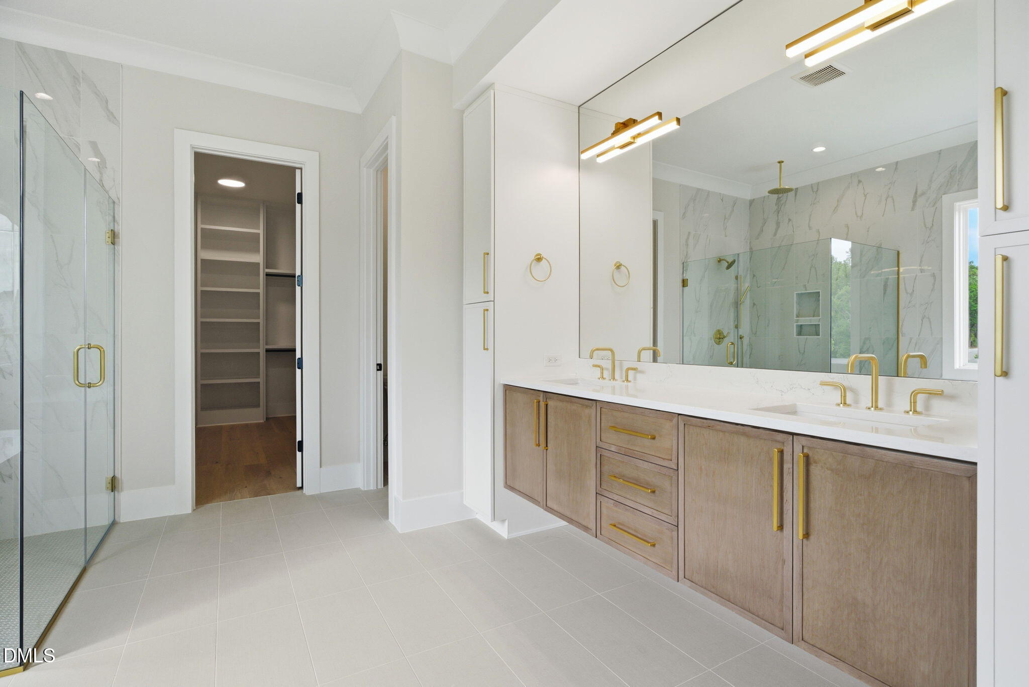1304 Sanctuary Pond Drive Raleigh, NC 27606 - Photo 23 of 52 a bathroom with a double vanity sink mirror and double