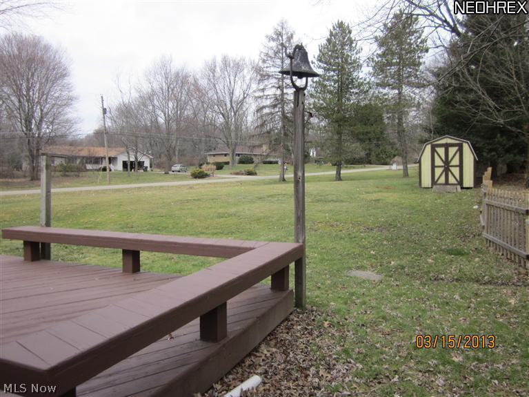 3537 Greenwich Road Norton, OH 44203 - Photo 11 of 21 Side view. See side of heated sun porch. Other side of porch is deck