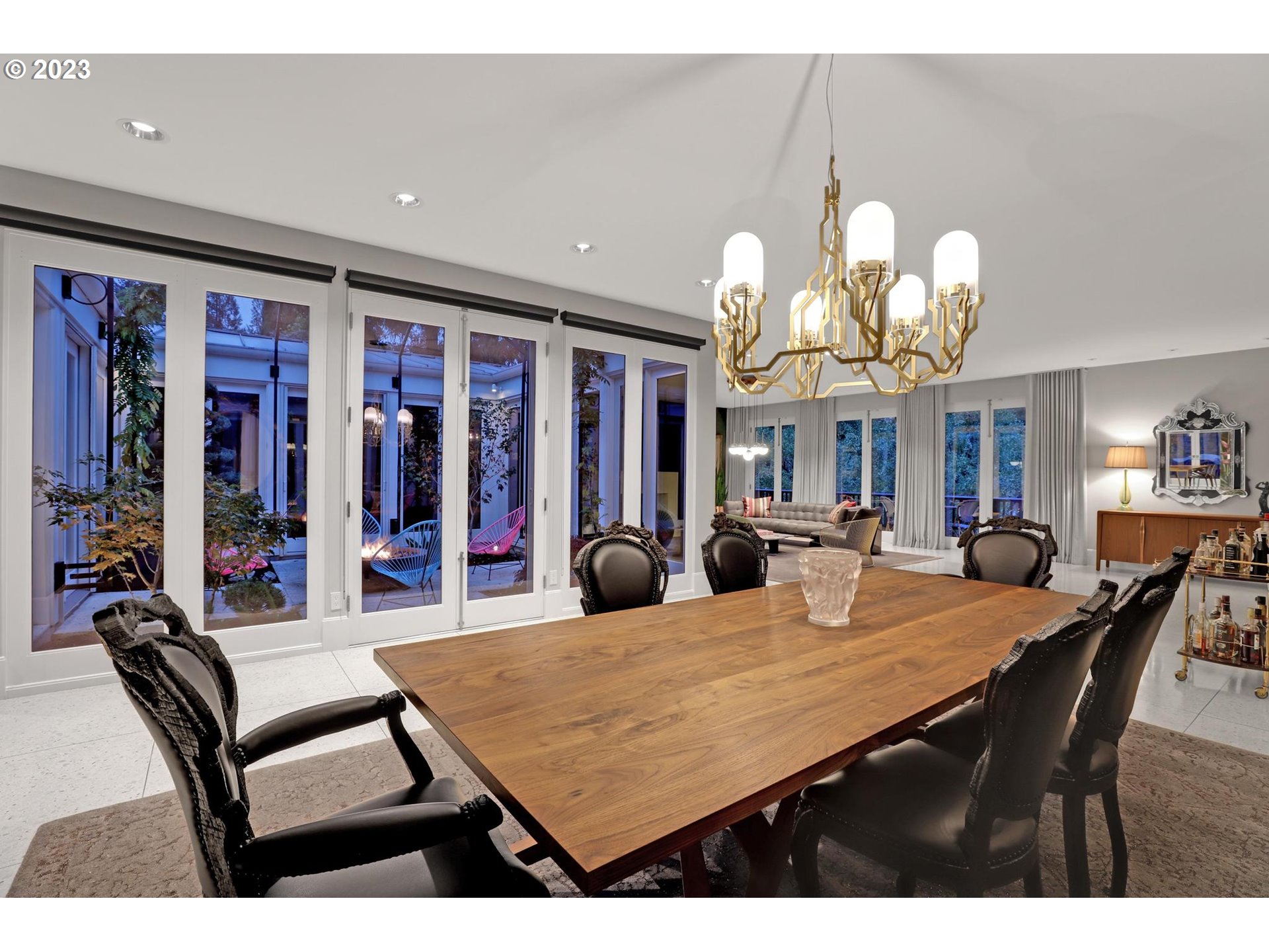 2122 Southwest Myrtle Street Portland, OR 97201 - Photo 12 of 47 a view of a dining room with furniture and chandelier