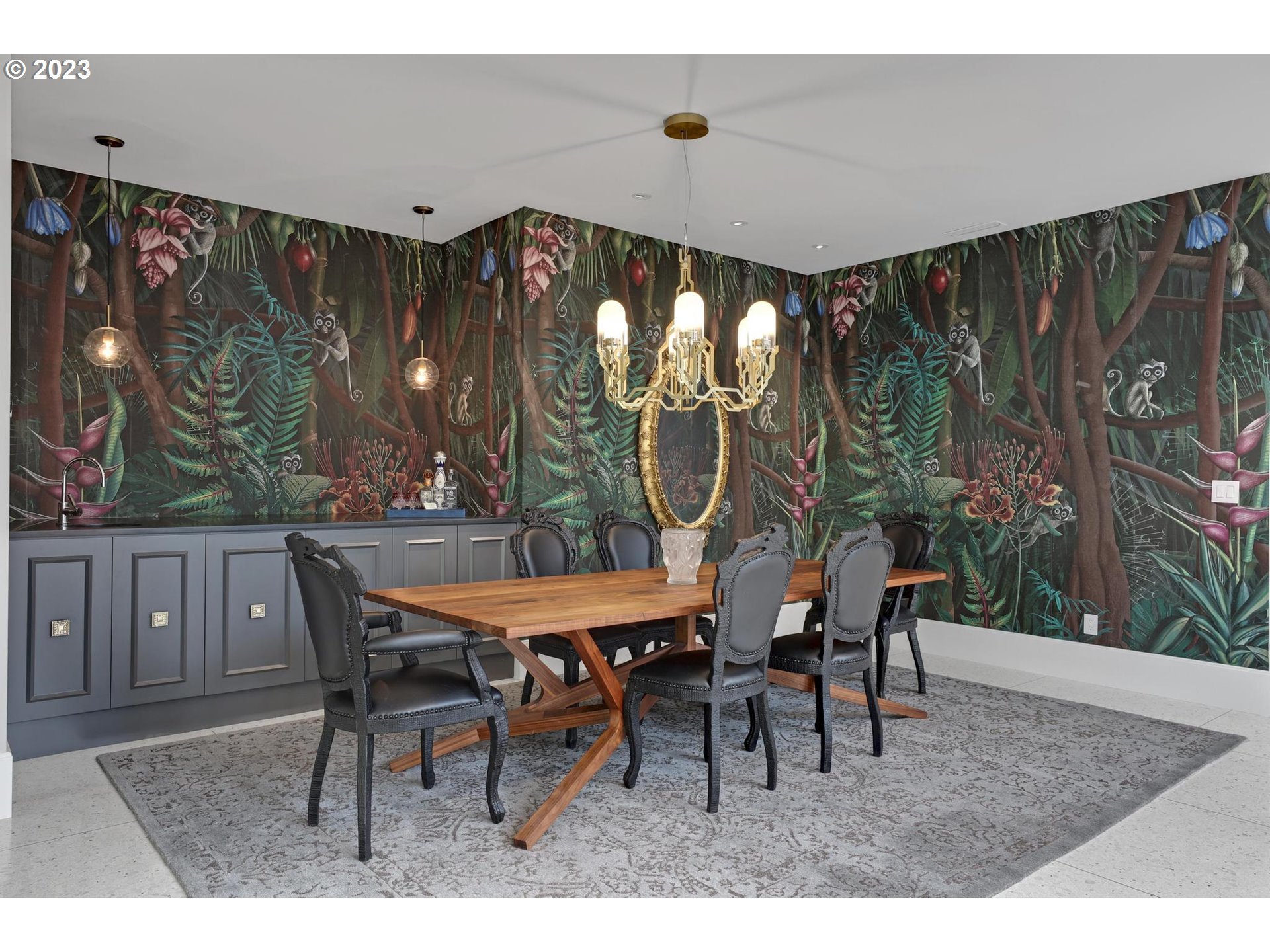 2122 Southwest Myrtle Street Portland, OR 97201 - Photo 14 of 47 a dining room with a wooden table and chairs