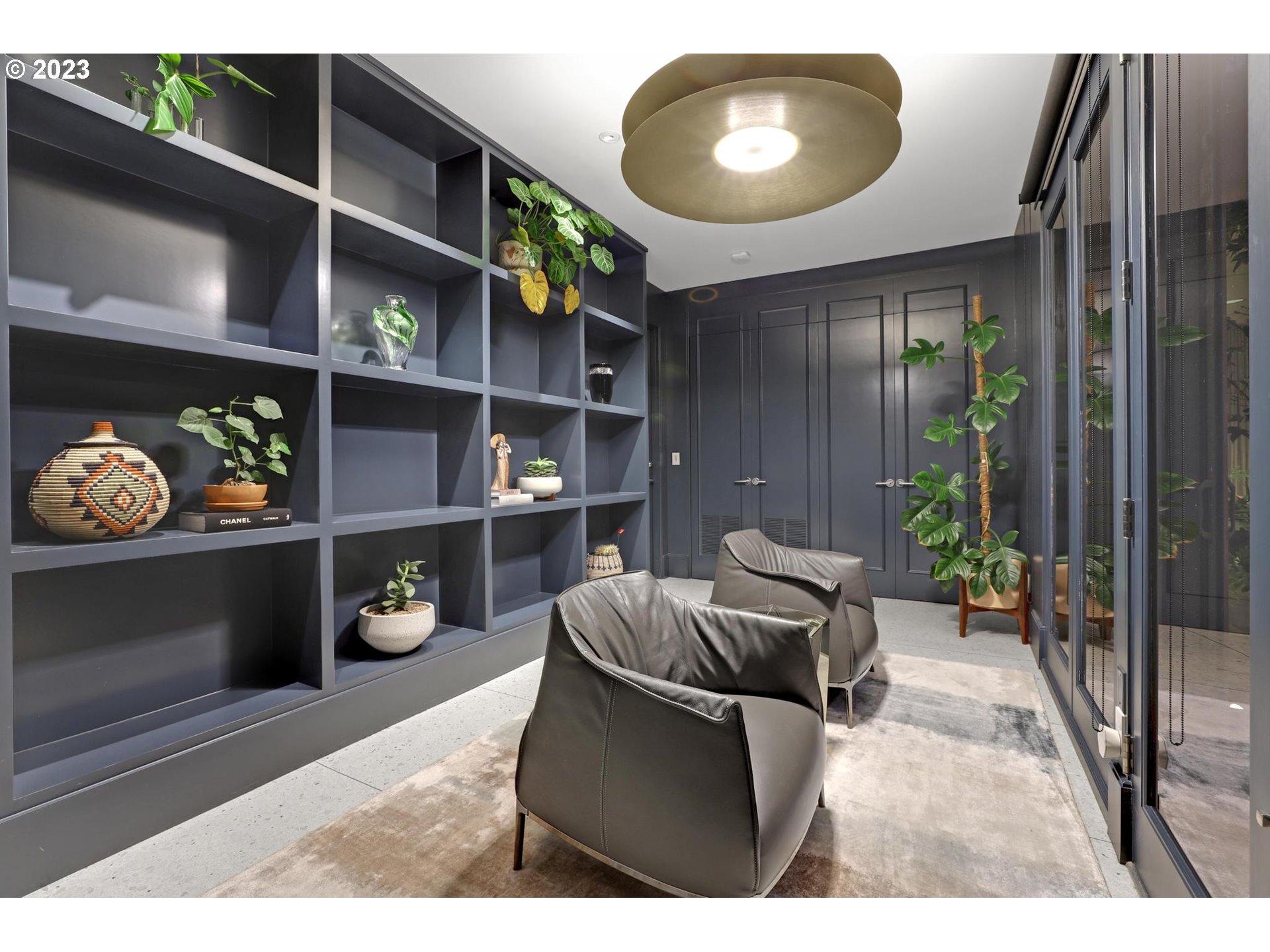 2122 Southwest Myrtle Street Portland, OR 97201 - Photo 32 of 47 a living room with furniture and a lamp