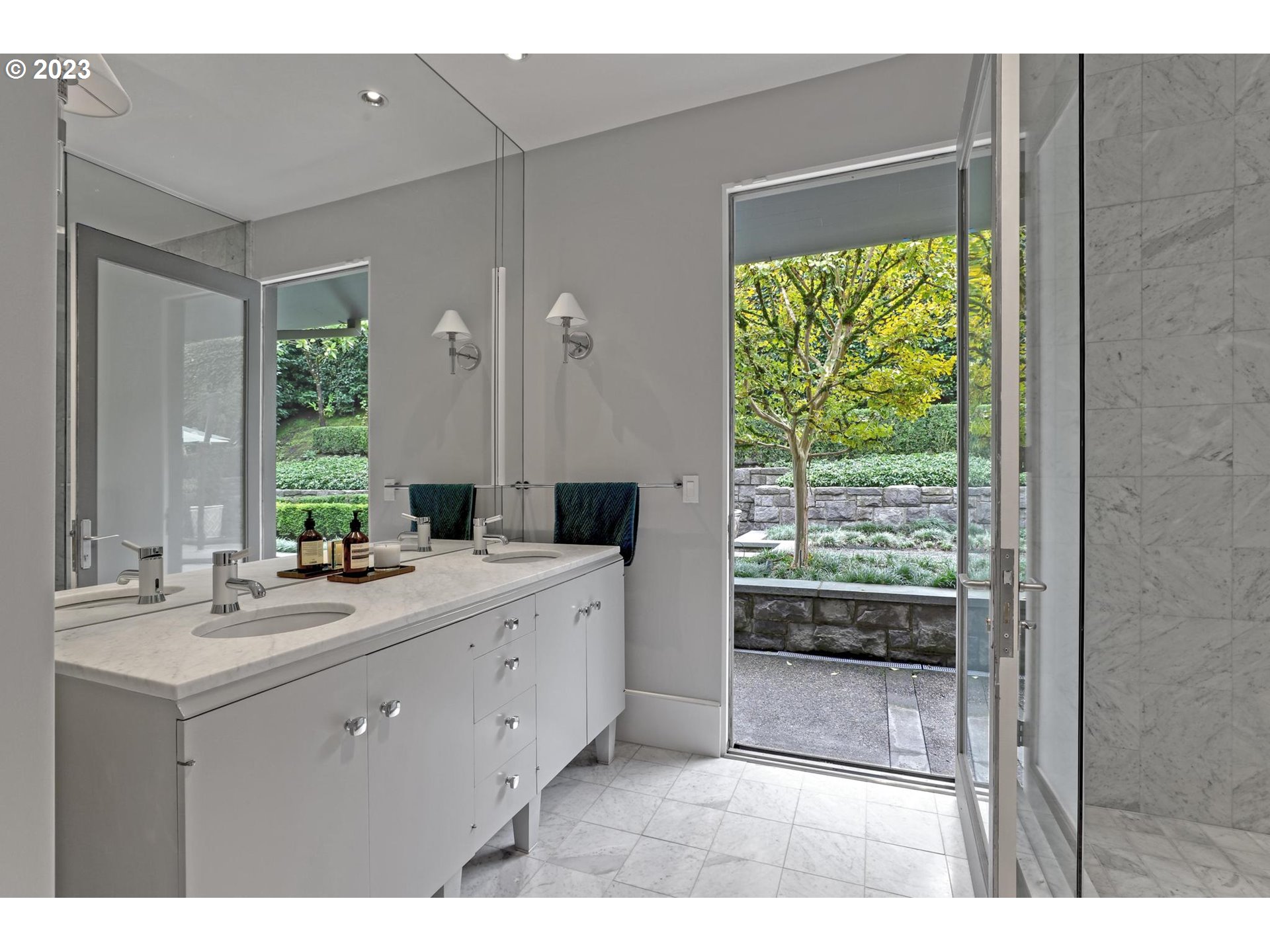 2122 Southwest Myrtle Street Portland, OR 97201 - Photo 39 of 47 a bathroom with a double vanity sink and mirror