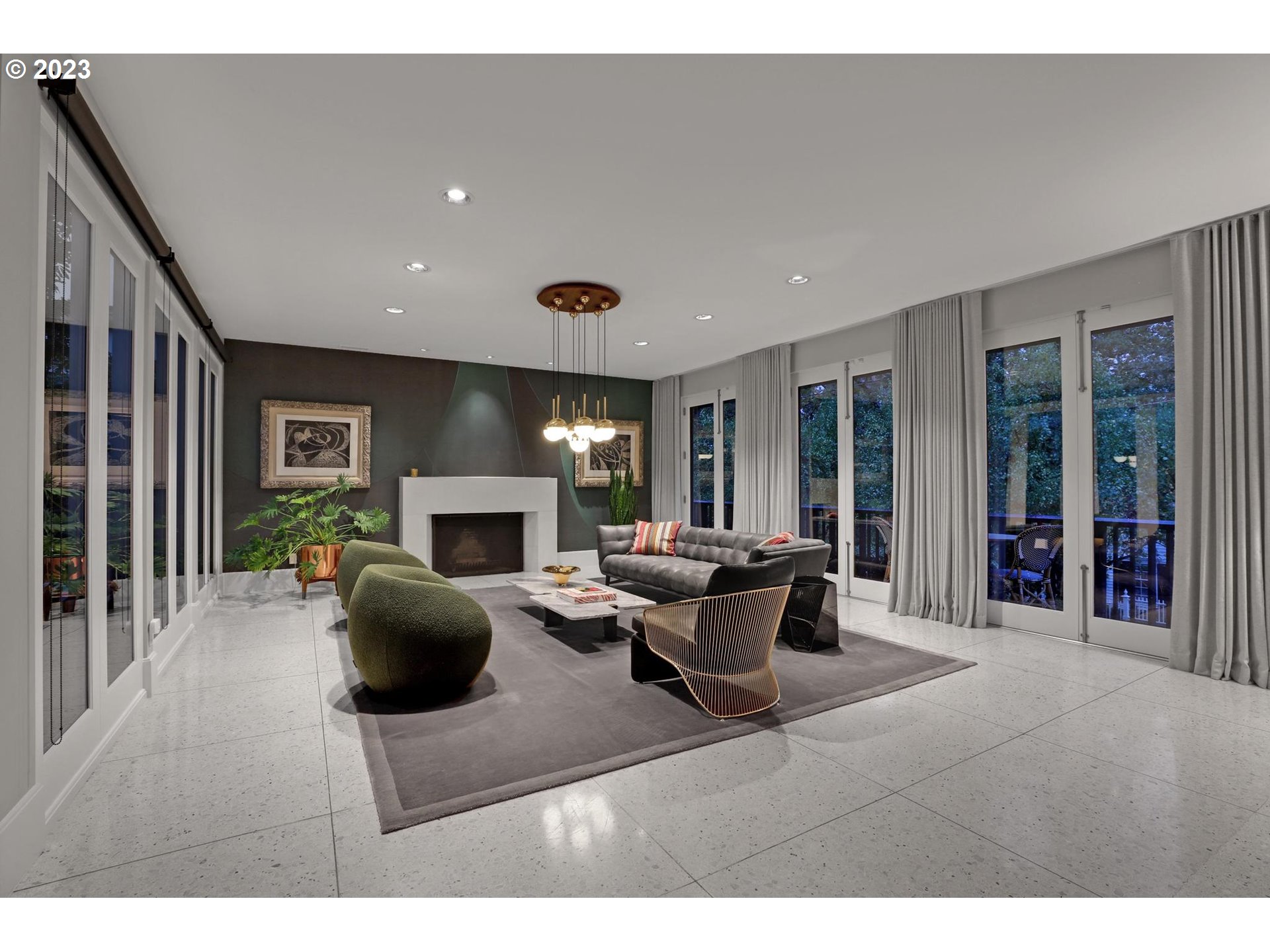 2122 Southwest Myrtle Street Portland, OR 97201 - Photo 6 of 47 a living room with furniture a fireplace and a flat screen tv