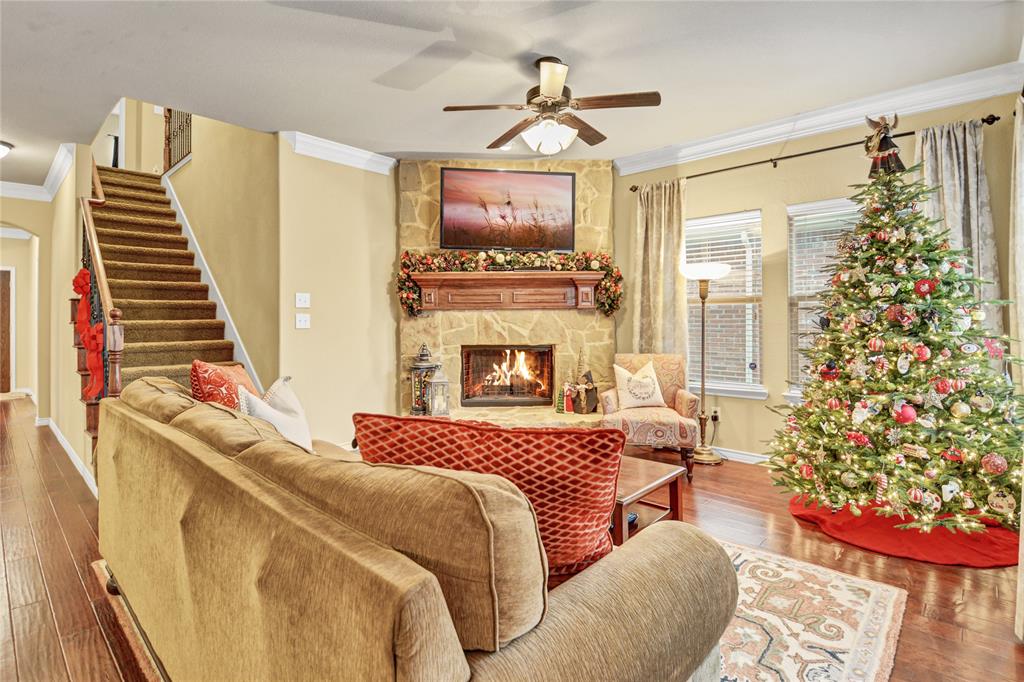 9979 Boyton Canyon Road Frisco, TX 75035 - Photo 1 of 1 a bedroom with a bed and a fireplace