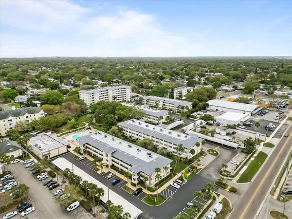 an aerial view of residential building and lake view