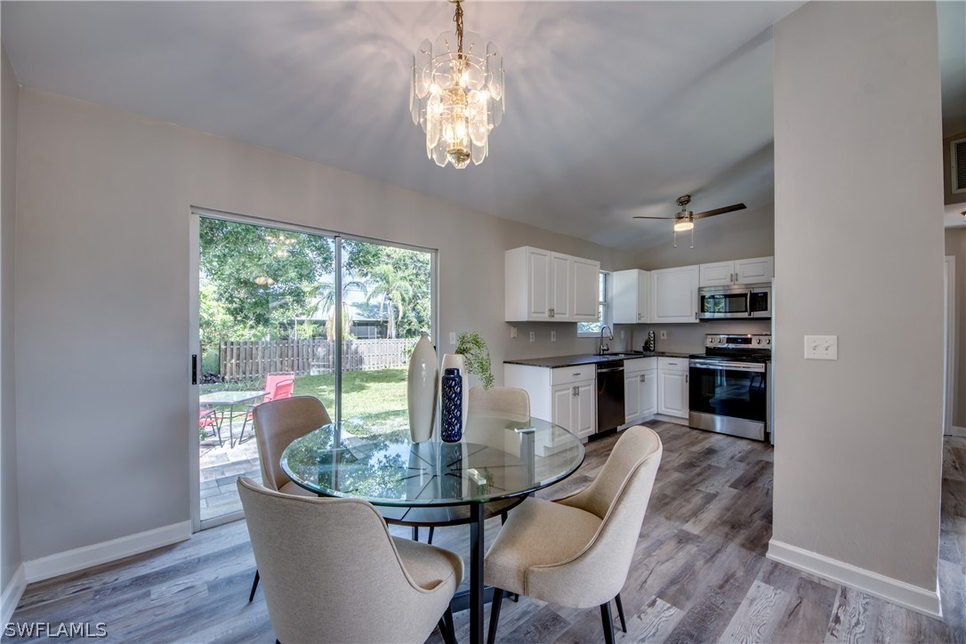 18372 Hawthorne Road Fort Myers, FL 33967 - Photo 9 of 28 a kitchen with a table and chairs