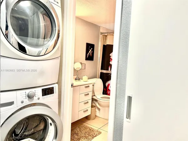 a view of washer and dryer in a utility room