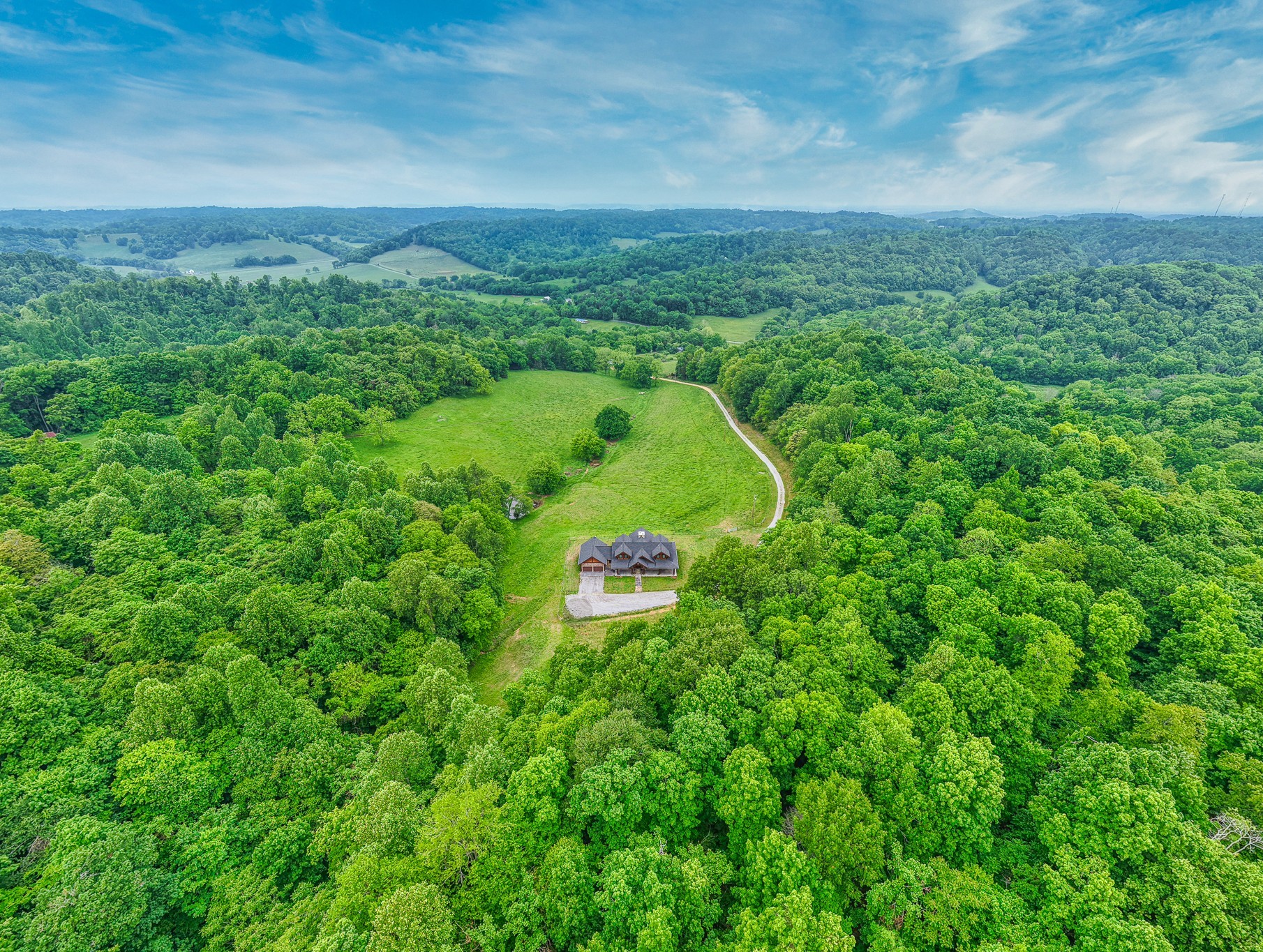 1271 Bivins Road Lewisburg, TN 37091 - Photo 3 of 56 a view of a green field with lots of bushes