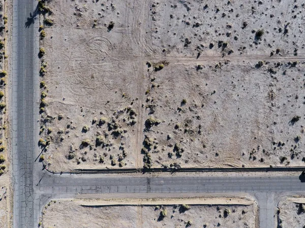 a view of a road with an ocean view