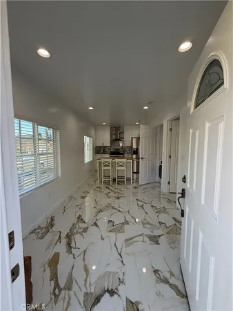 a view of kitchen and windows