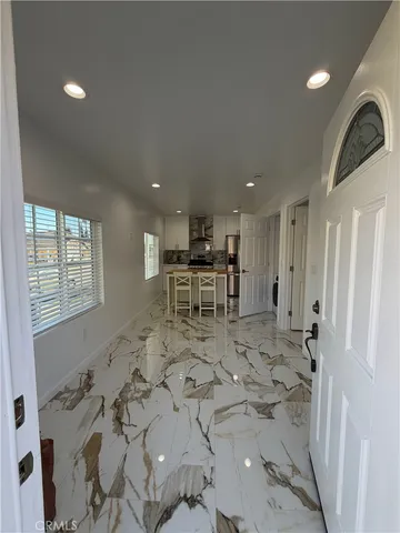a view of kitchen and windows