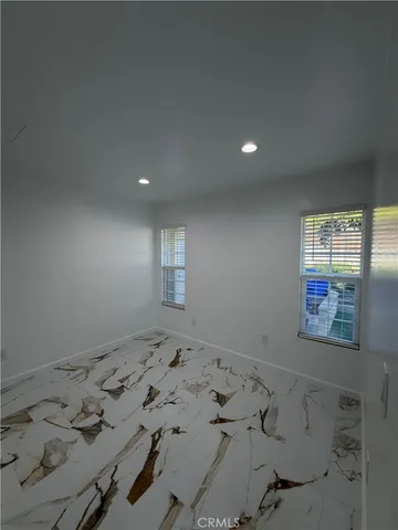 a view of a window in an empty room