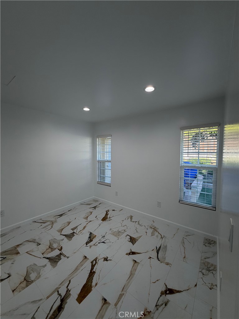 7476 Brookside Road Rancho Cucamonga, CA 91730 - Photo 9 of 13 a view of a window in an empty room