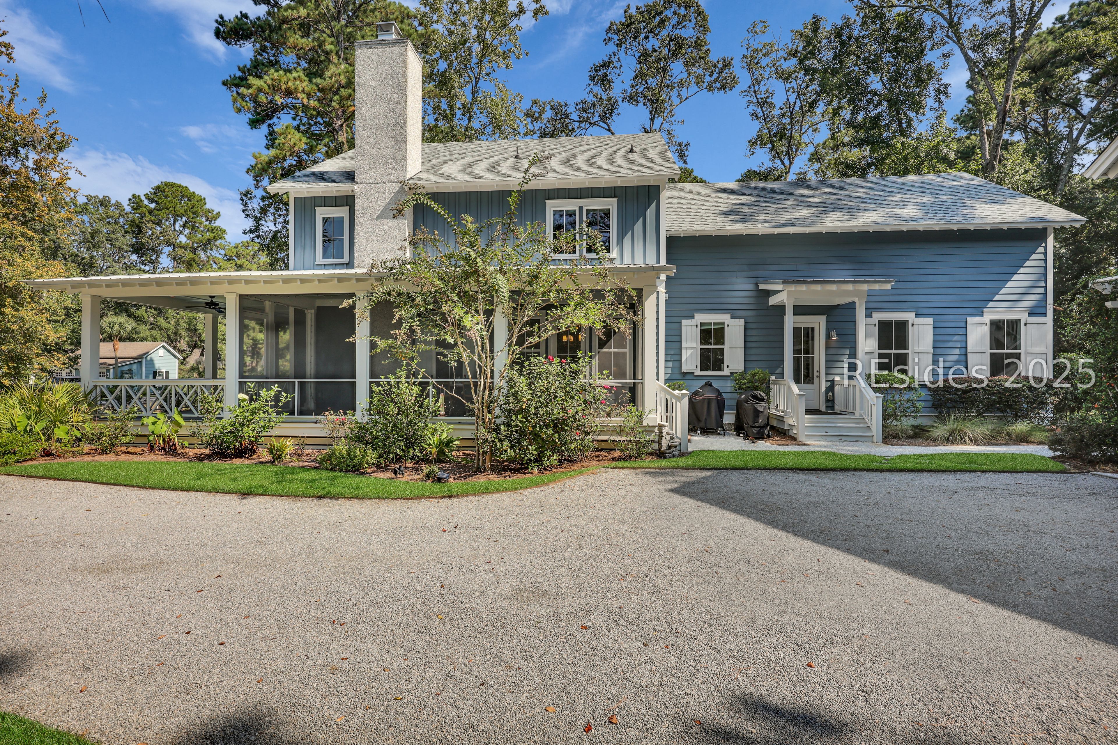 2 Oldfield Village Road Bluffton, SC 29909 - Photo 24 of 37 View of the south side, featuring screened porch