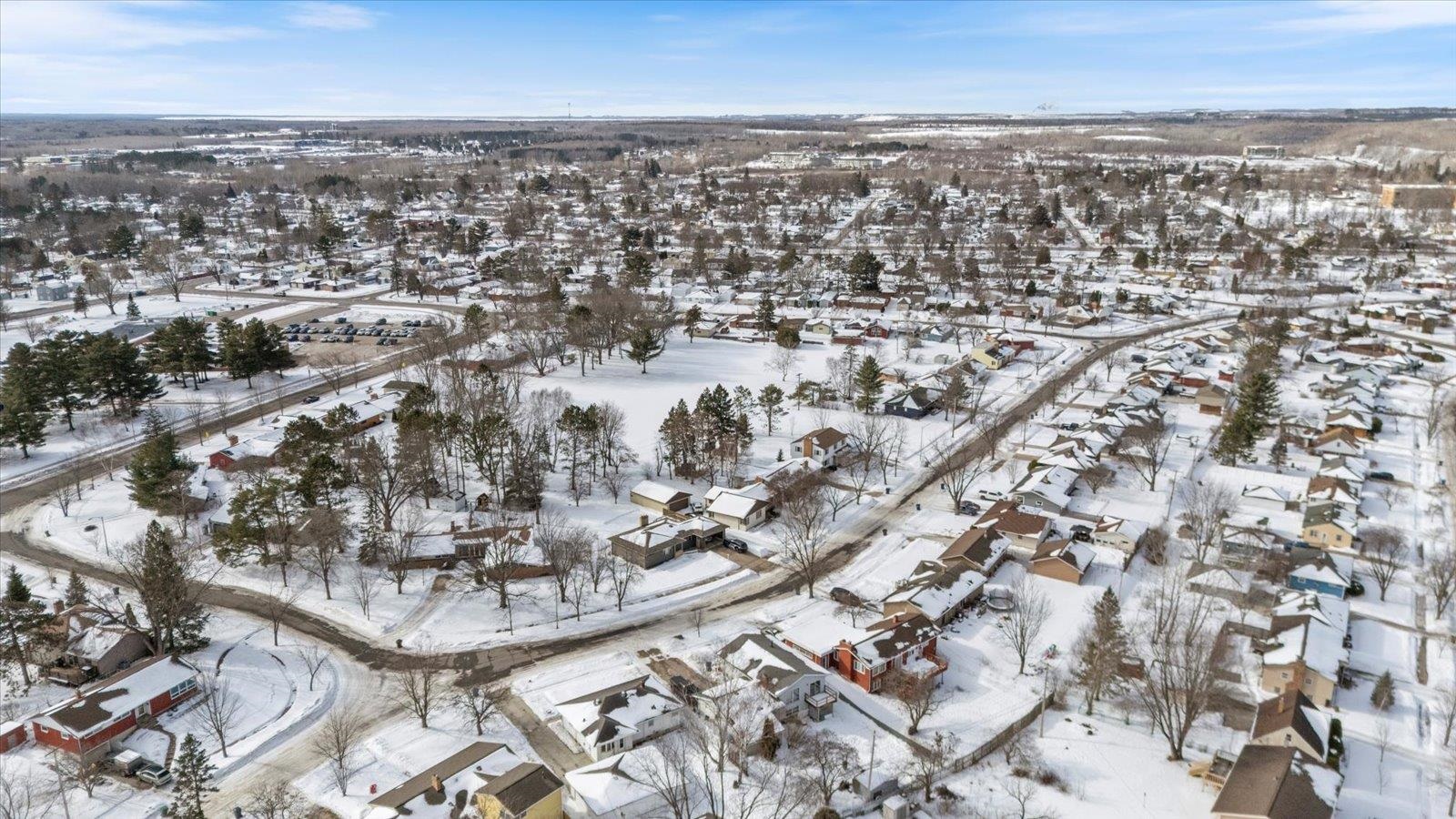 502 North Inner Drive Hibbing, MN 55746 - Photo 12 of 57 Snowy aerial view featuring a residential view