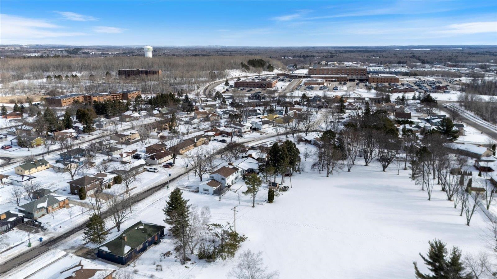 502 North Inner Drive Hibbing, MN 55746 - Photo 13 of 57 Snowy aerial view with a residential view