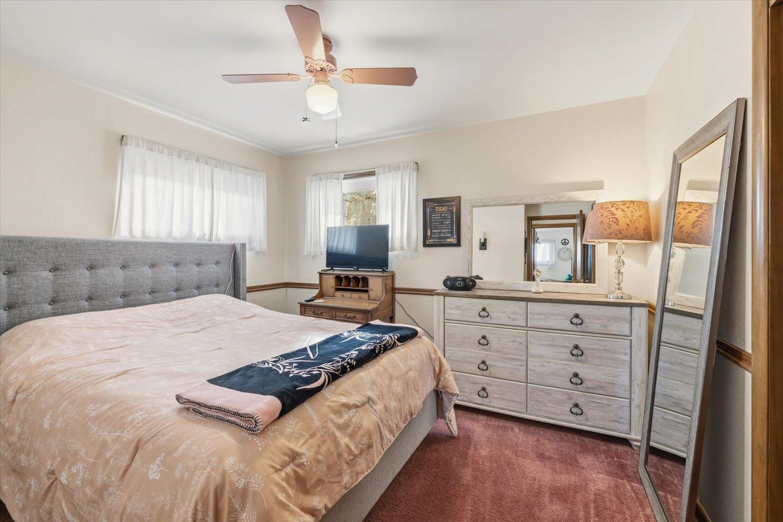 502 North Inner Drive Hibbing, MN 55746 - Photo 35 of 57 Bedroom with dark colored carpet and a ceiling fan