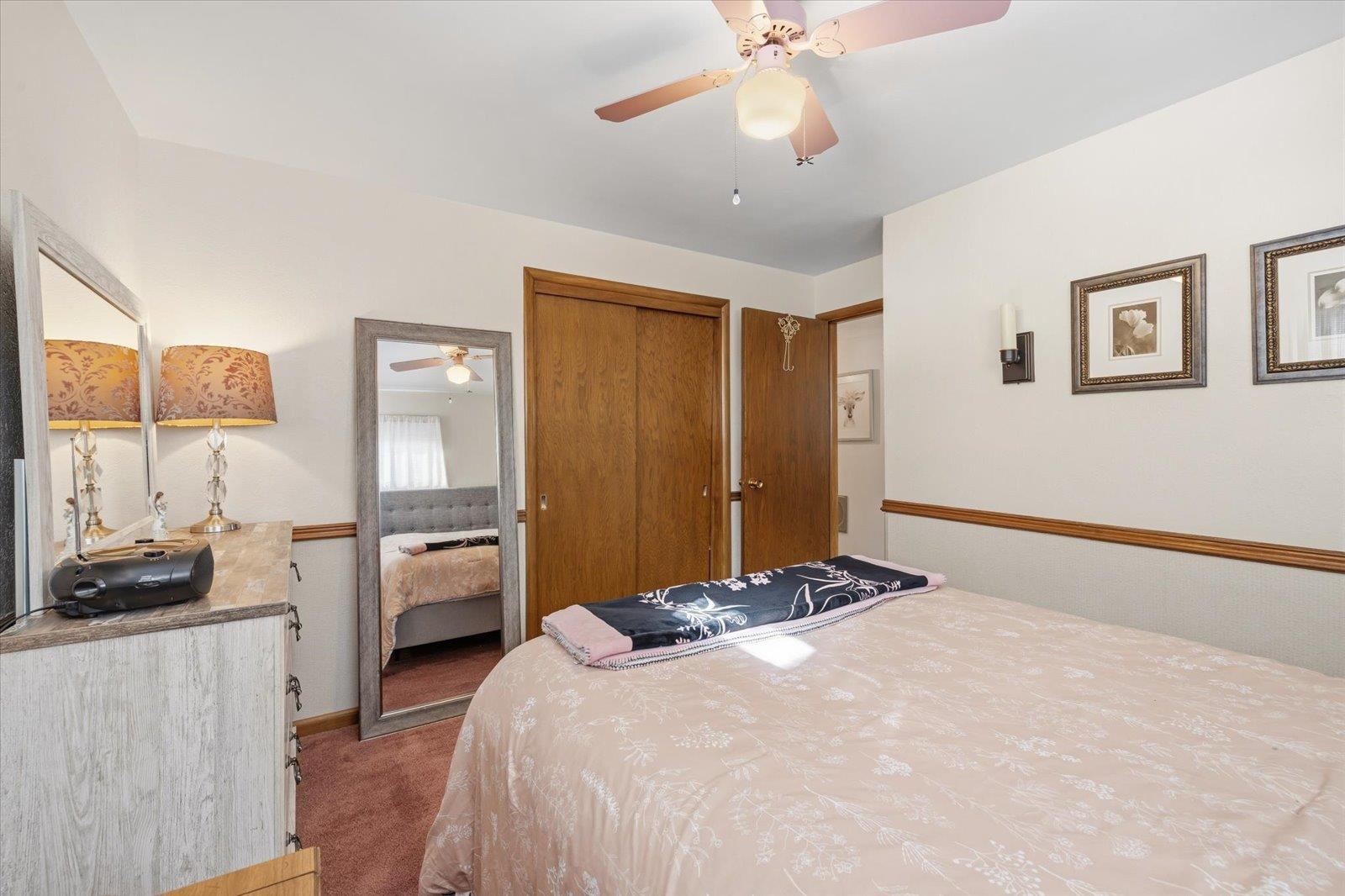 502 North Inner Drive Hibbing, MN 55746 - Photo 36 of 57 Carpeted bedroom with a ceiling fan and a closet