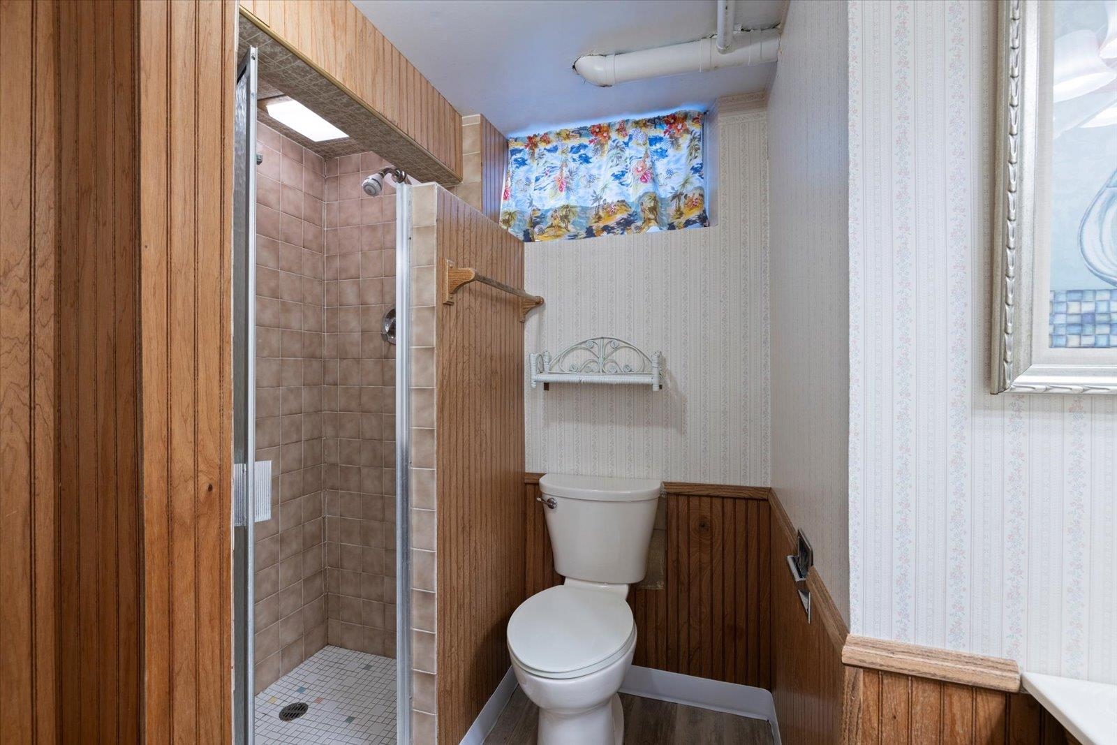 502 North Inner Drive Hibbing, MN 55746 - Photo 38 of 57 Bathroom with wallpapered walls and a shower stall