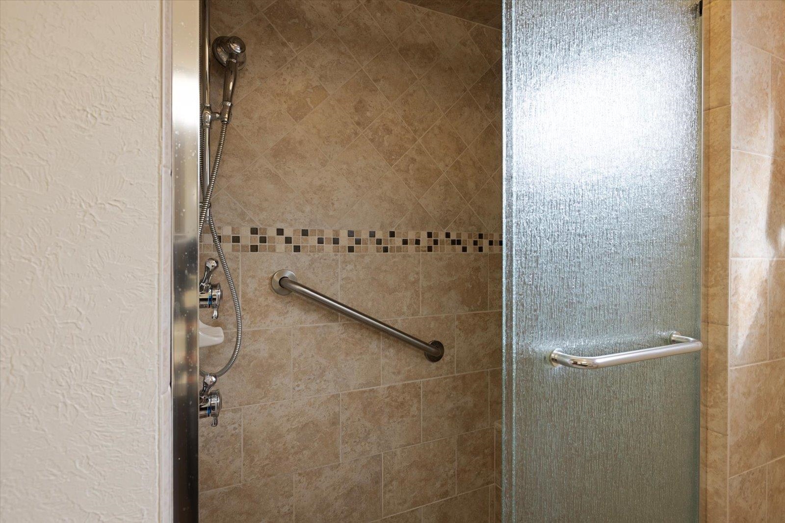 502 North Inner Drive Hibbing, MN 55746 - Photo 39 of 57 Full bath with a shower stall and a textured wall