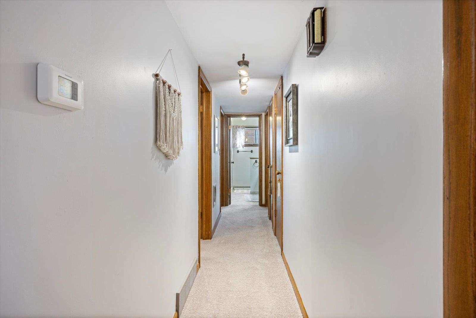 502 North Inner Drive Hibbing, MN 55746 - Photo 41 of 57 Corridor with light colored carpet and baseboards