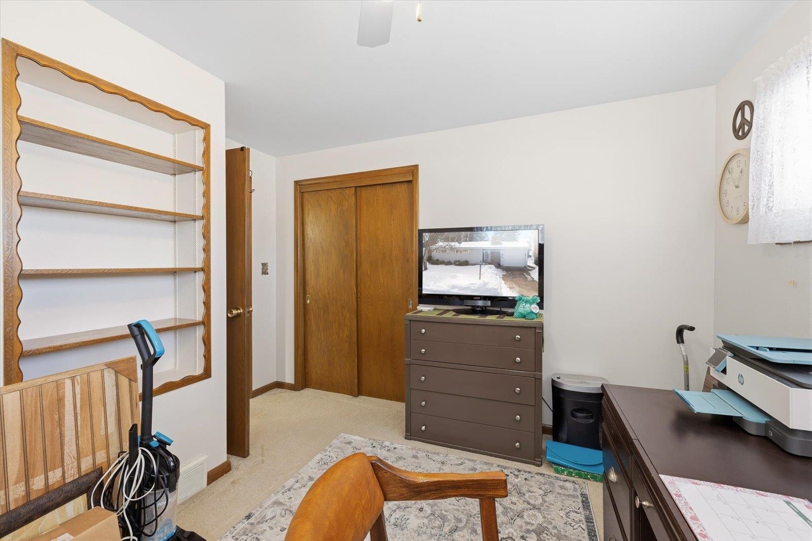 502 North Inner Drive Hibbing, MN 55746 - Photo 43 of 57 Office area with light colored carpet and ceiling fan