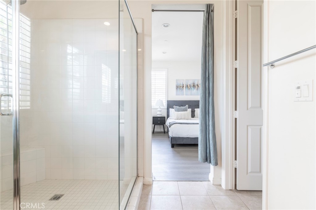 816 East Promenade, Unit A Azusa, CA 91702 - Photo 46 of 75 a en suite bathroom with a sink and a mirror