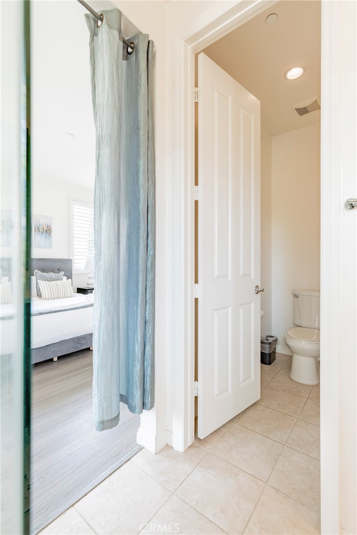 816 East Promenade, Unit A Azusa, CA 91702 - Photo 53 of 75 a bathroom with a sink and a mirror