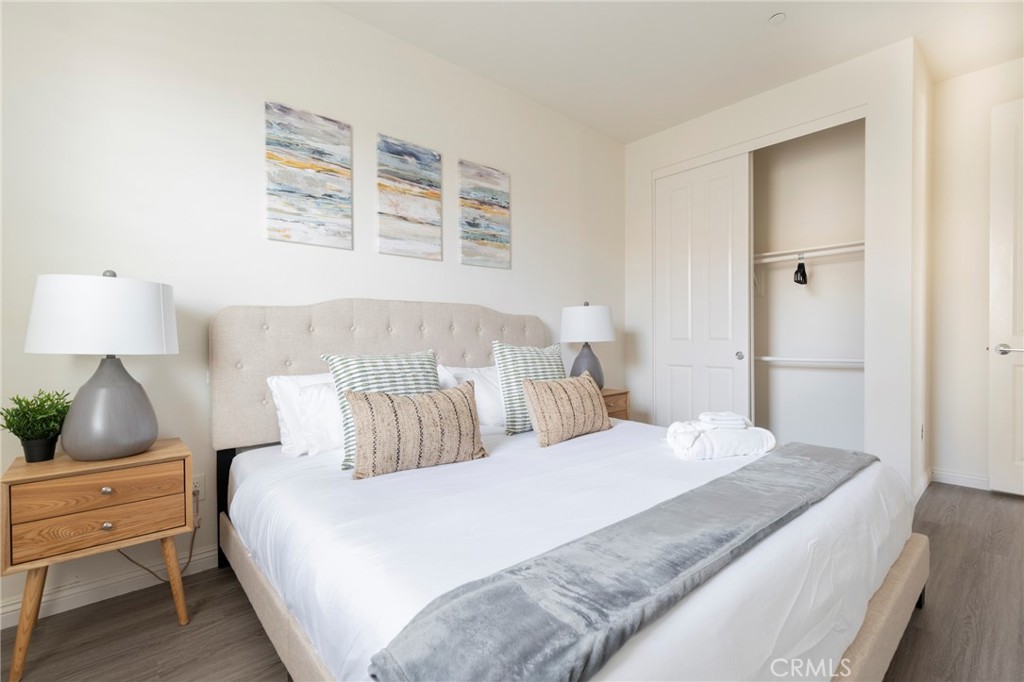 816 East Promenade, Unit A Azusa, CA 91702 - Photo 66 of 75 a bedroom with a bed and a night stand