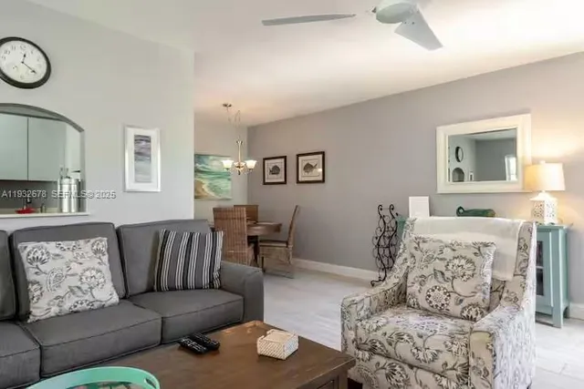 a living room with furniture and a couch