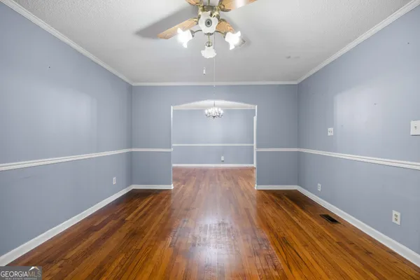 a view of entryway and hall with a window