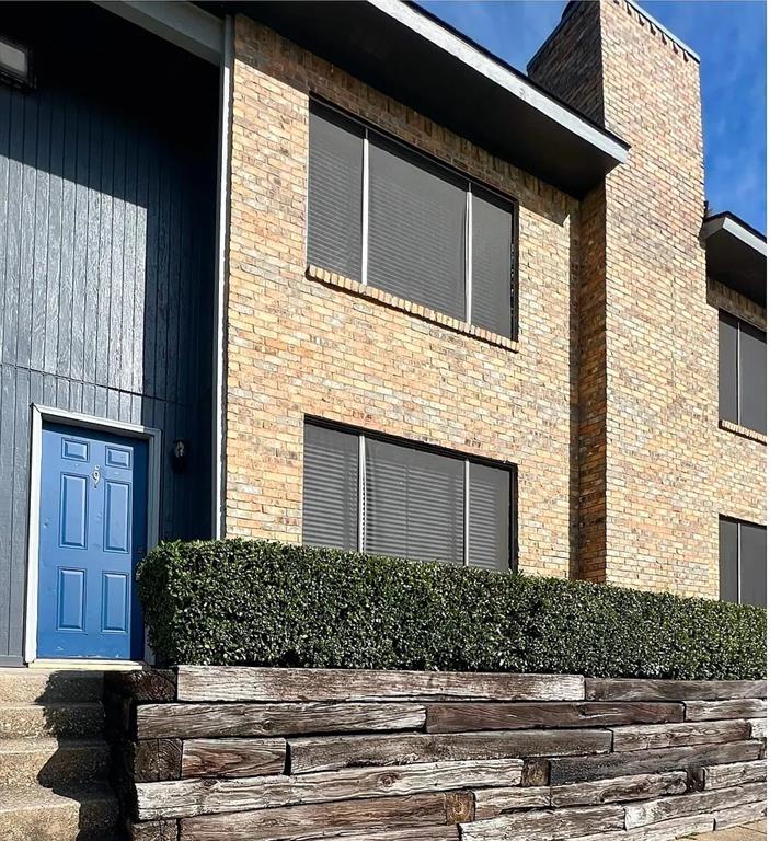 514 East Belt Line Road, Unit B13 DeSoto, TX 75115 - Photo 28 of 28 a front view of a house with a yard