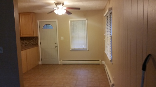 39232 North Rustic Drive Lake Villa, IL 60046 - Photo 11 of 12 a view of a livingroom with a ceiling fan and window
