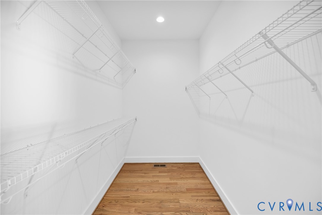 19106 Carson Road Dinwiddie, VA 23841 - Photo 15 of 34 Primary bedroom WIC. Recessed ceiling light, wood-