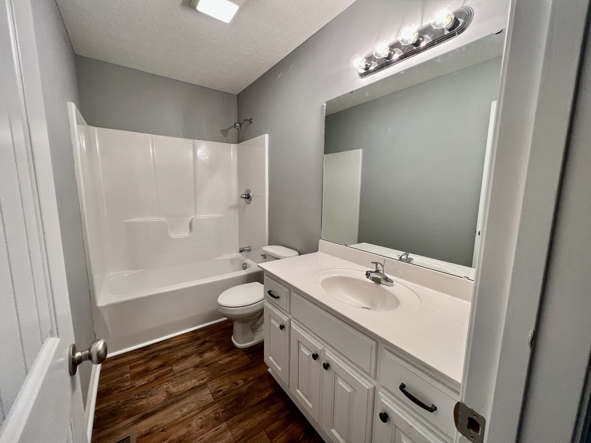 2379 Franklin Hayes Road Pulaski, TN 38478 - Photo 15 of 19 a bathroom with a double vanity sink toilet and shower