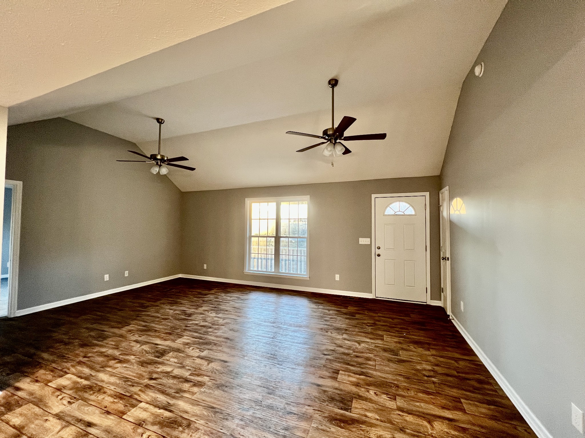 2379 Franklin Hayes Road Pulaski, TN 38478 - Photo 8 of 19 wooden floor in an empty room with a window