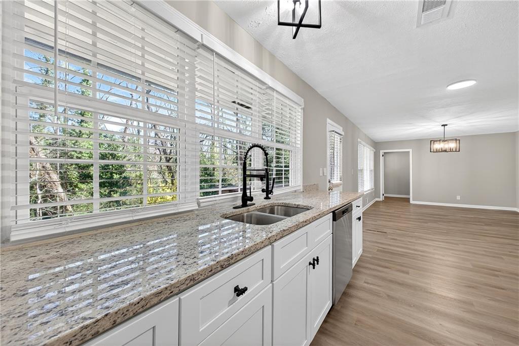187 Old Timber Road Lawrenceville, GA 30046 - Photo 7 of 32 a large kitchen with a large window