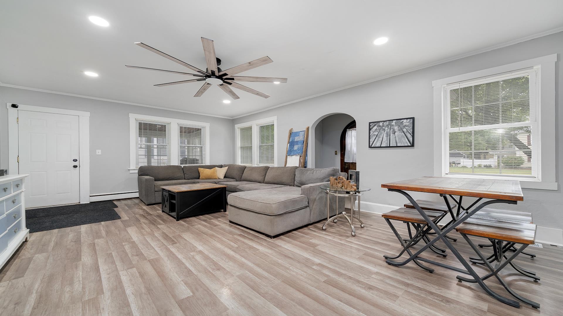 708 West Washington Street Oregon, IL 61061 - Photo 2 of 26 a living room with furniture and wooden floor