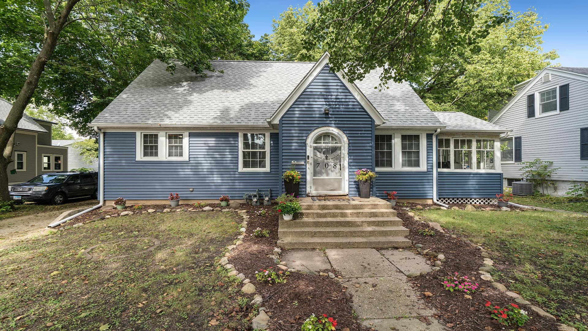 708 West Washington Street Oregon, IL 61061 - Photo 24 of 26 a front view of a house with a yard